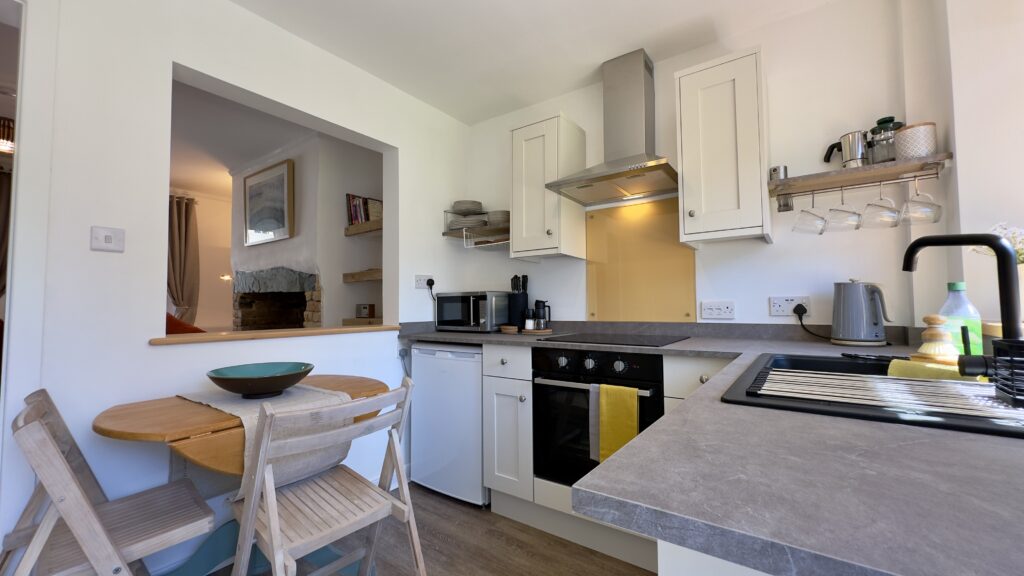 Well-equipped kitchen at Crofts Cottage in Keswick