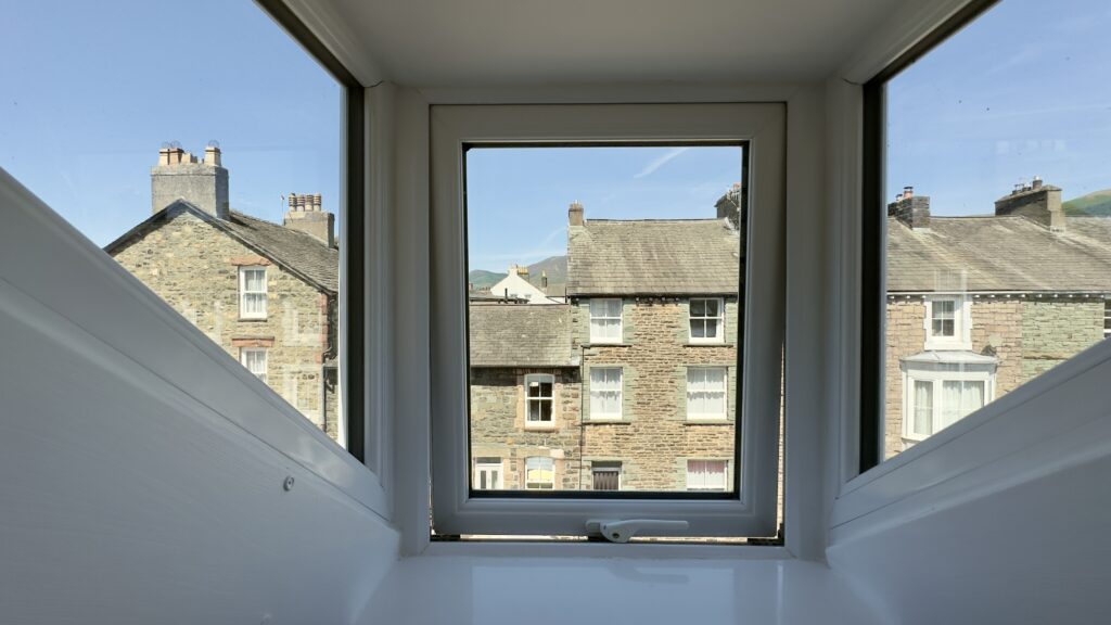 View from the top-floor twin bedroom across neighbouring Keswick rooftops